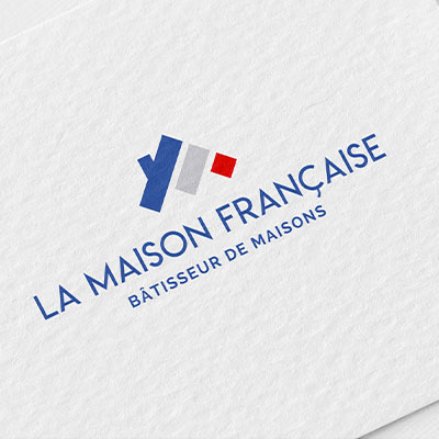 Logo La Maison Française posé sur une carte de visite